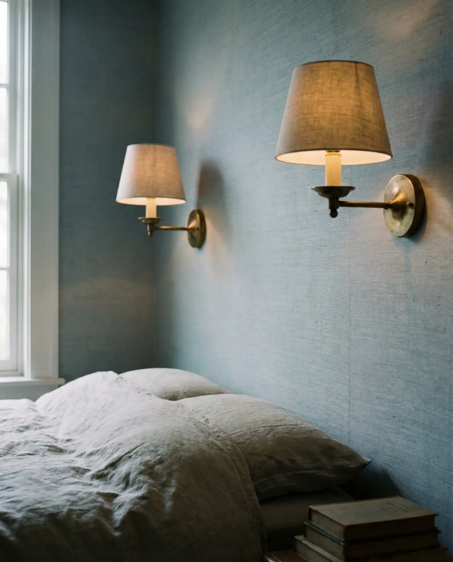Blue Walls with Warm Brass Sconces 2