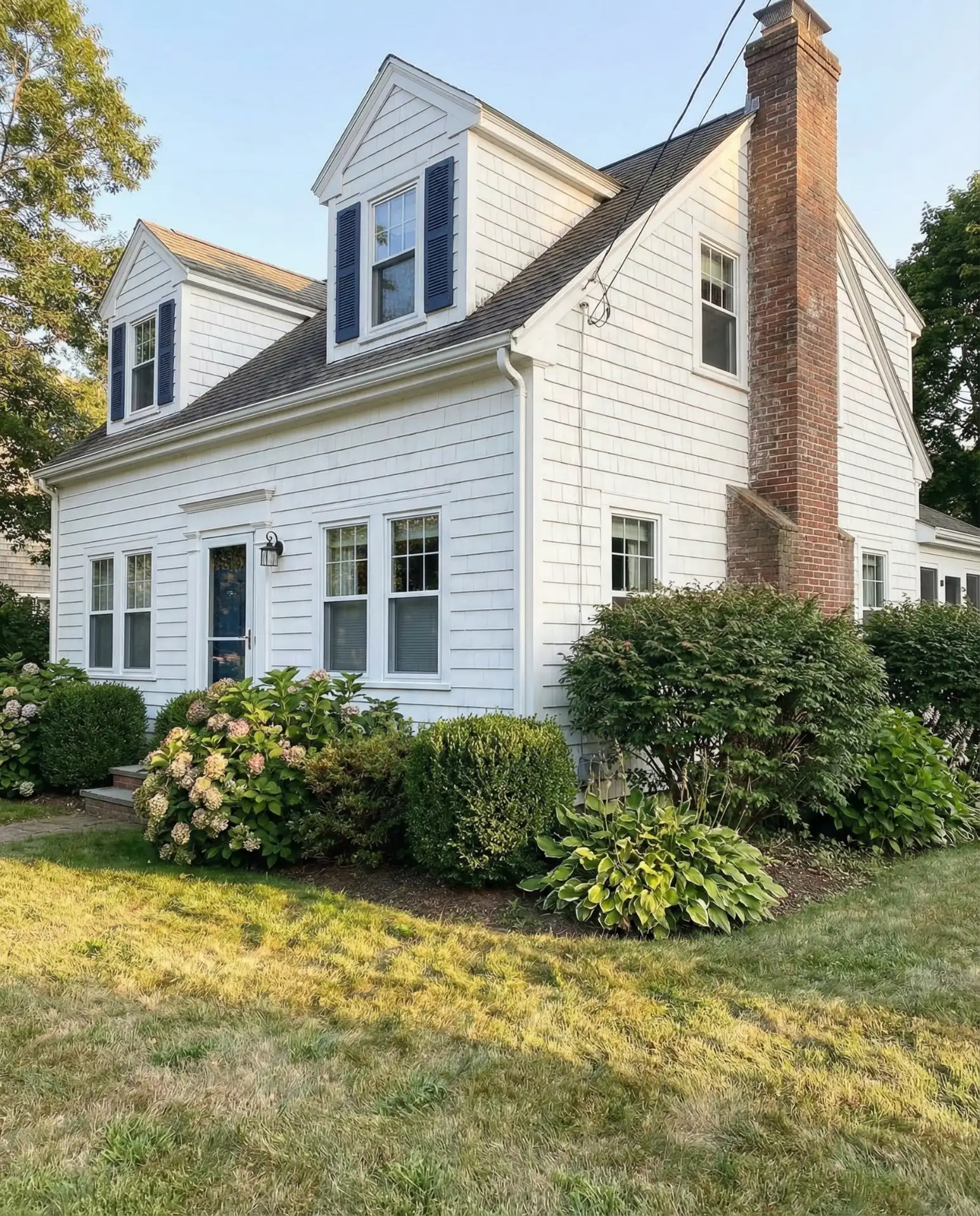 Classic White Shingles with Navy Shutters 1