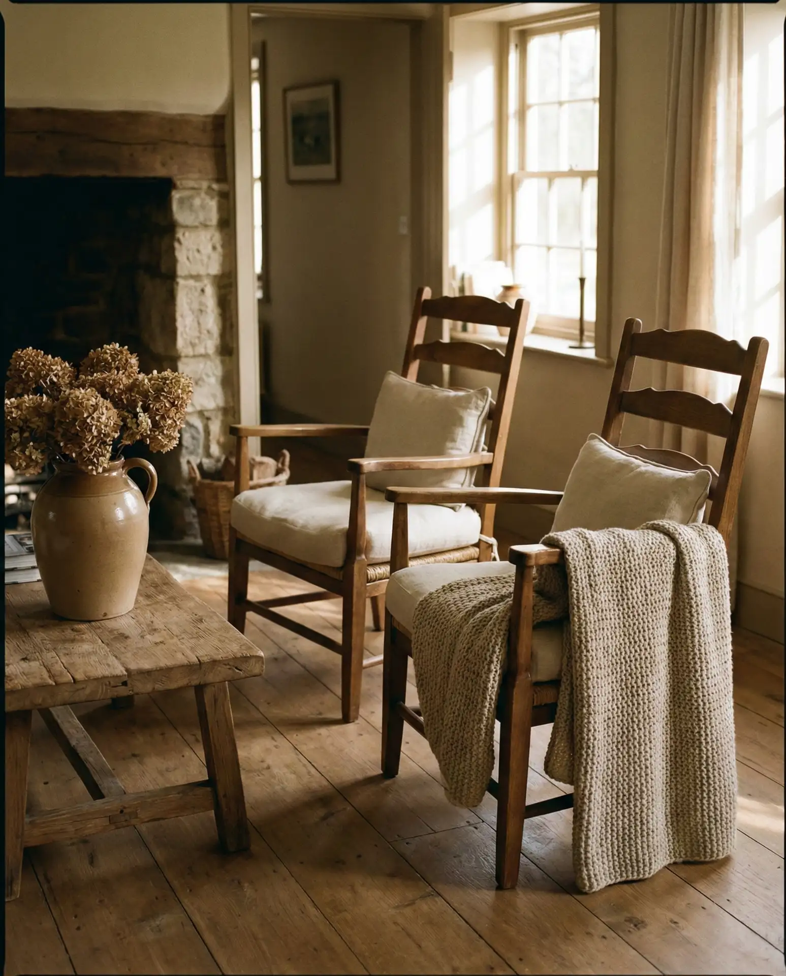 Country Cottage Living Room with Wide-Plank Floors 1
