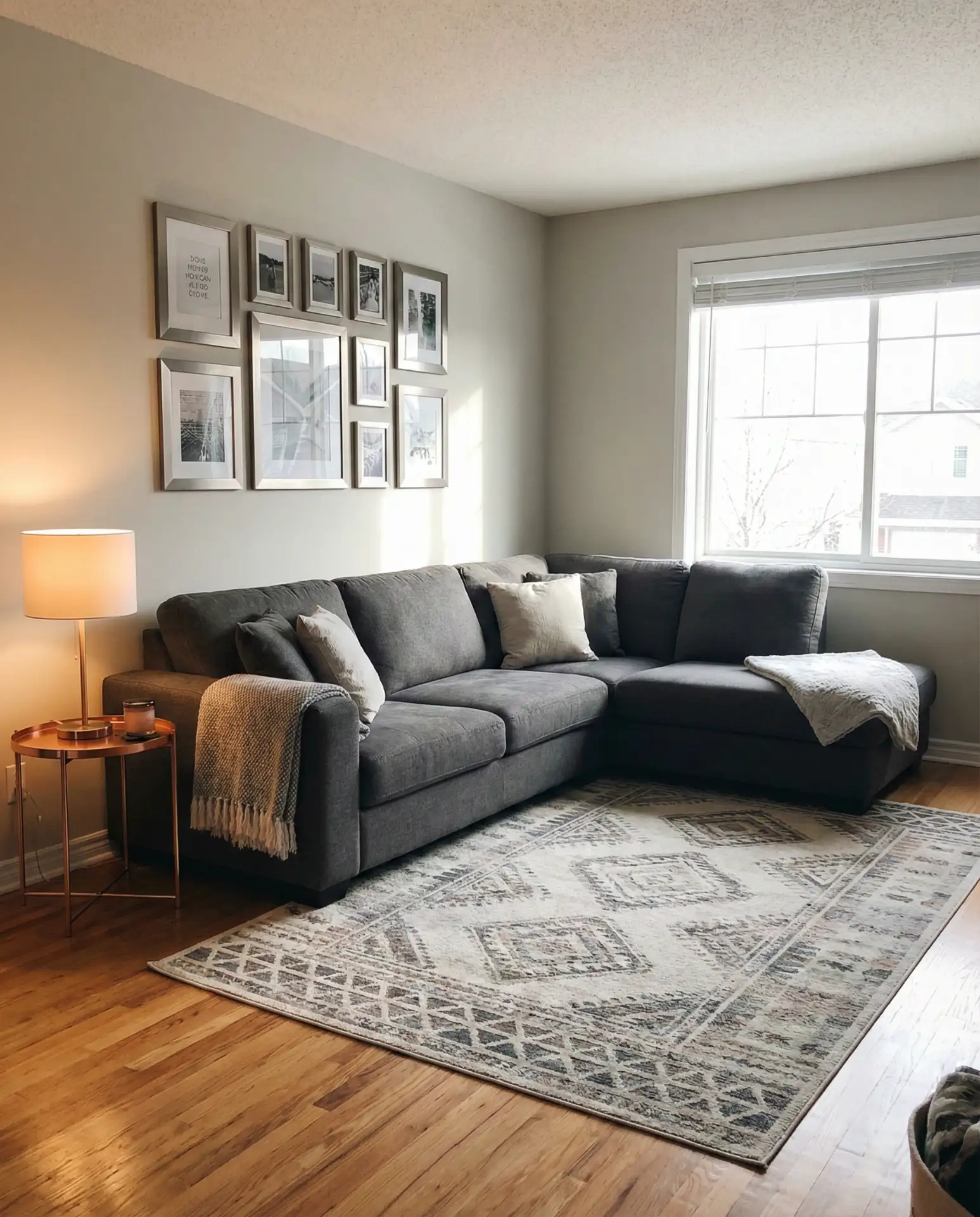 Dark Grey Sectional with Metallic Accents 2