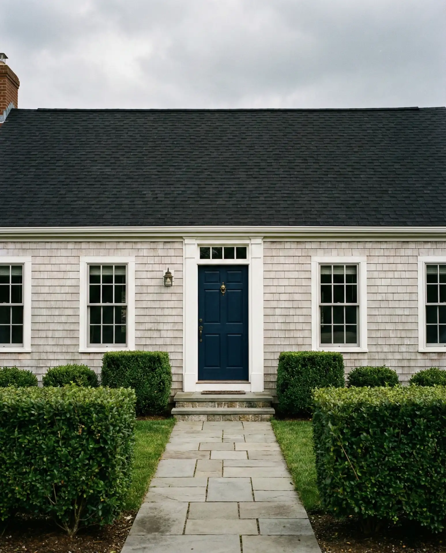 Pale Grey with Navy Door and Black Roof 1