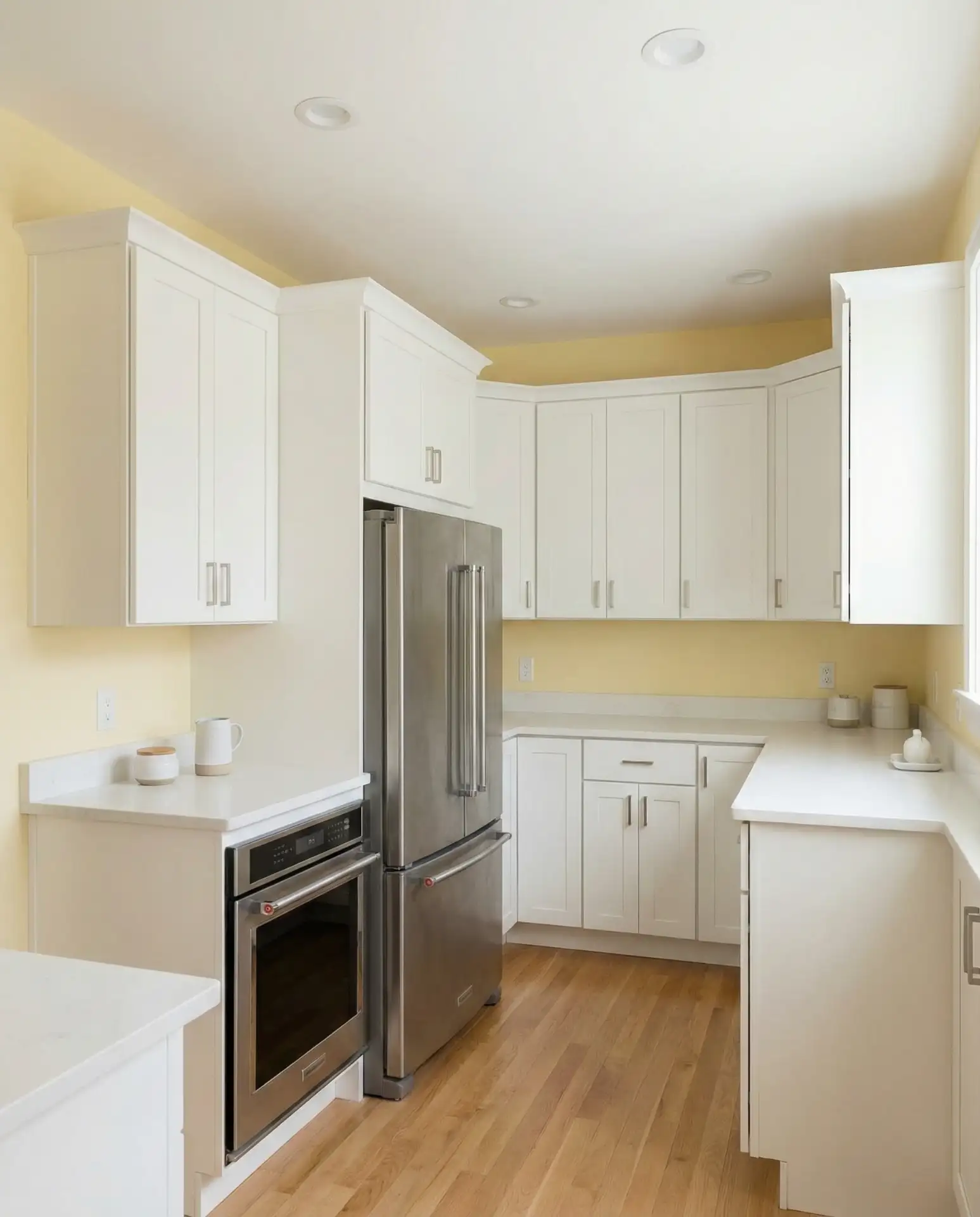 Pastel Yellow Walls with White Cabinets 1