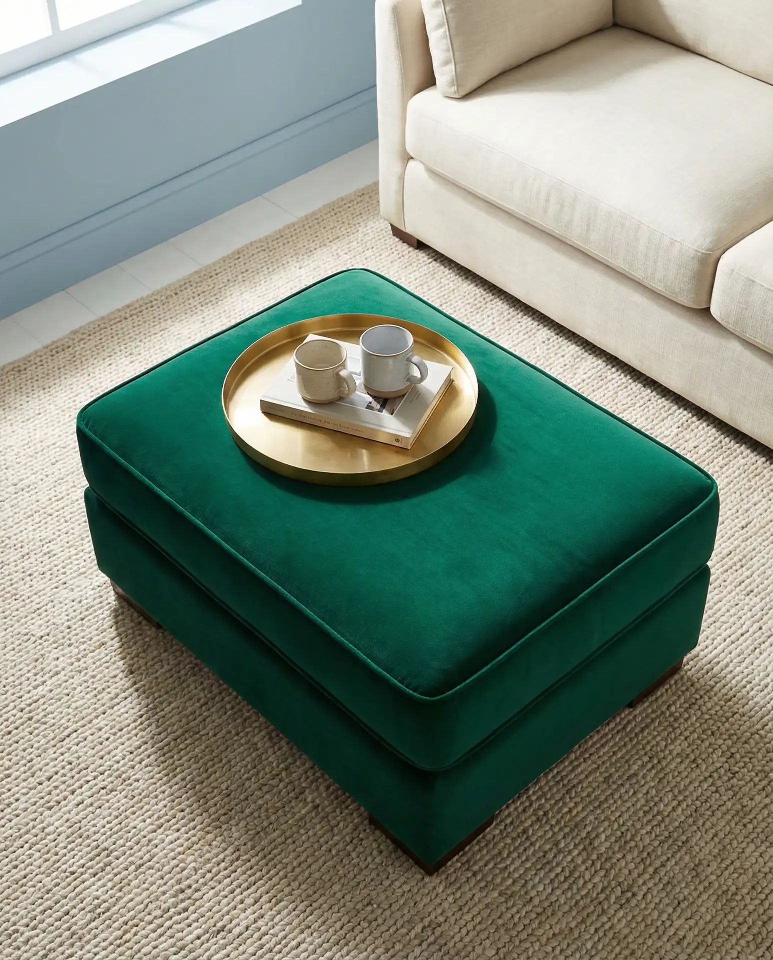 Powder Blue Walls with Emerald Velvet Ottoman 1