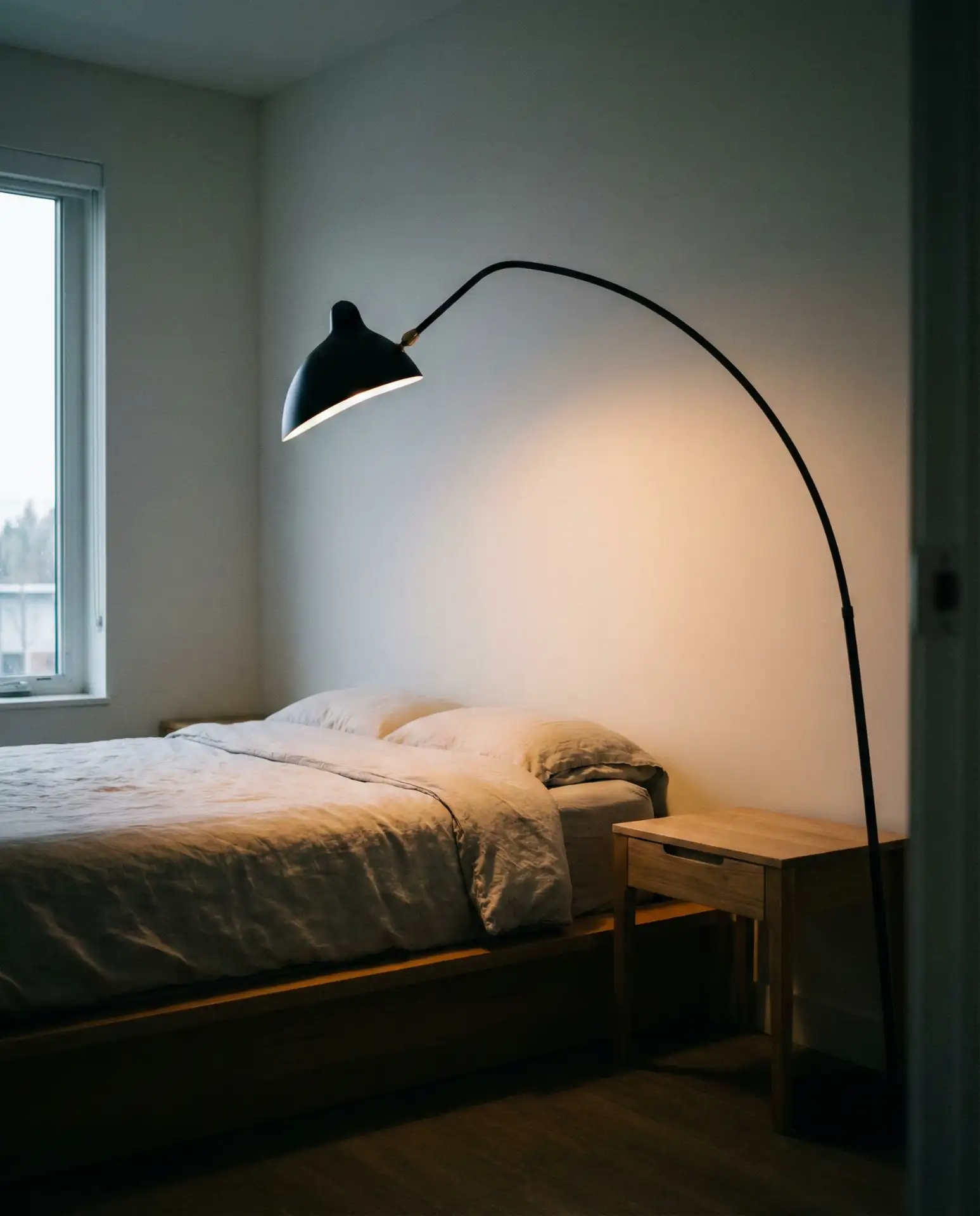 Statement Arc Floor Lamp Beside the Bed 2