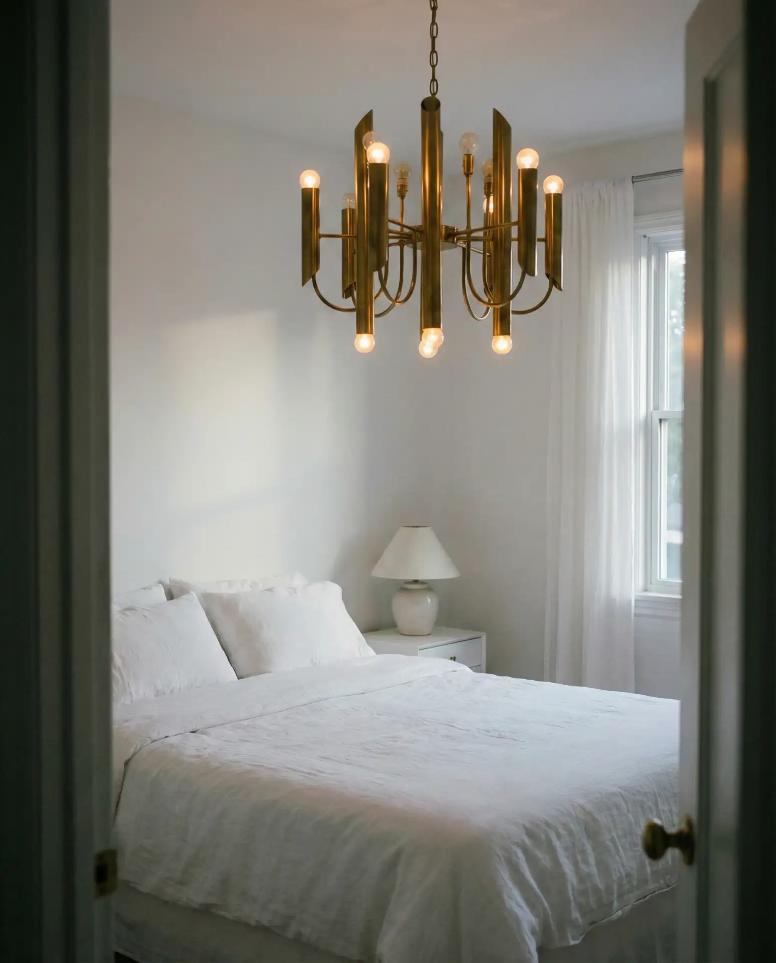 White Bedroom with Statement Lighting 2