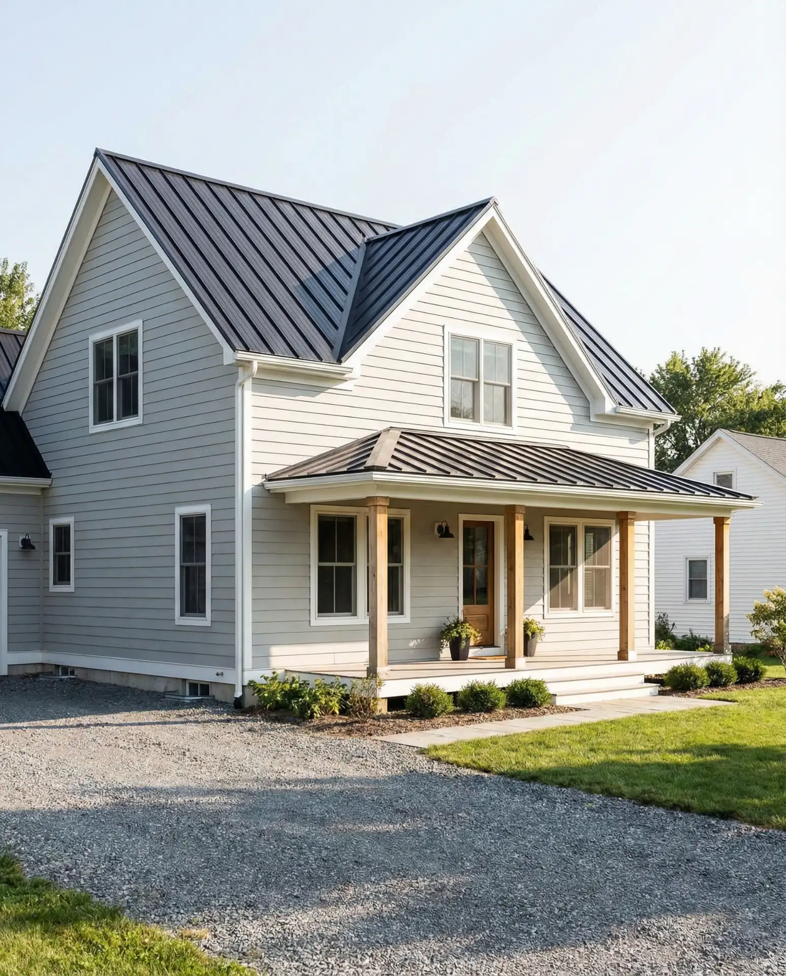 Black Metal Roof with Light Gray Siding 2