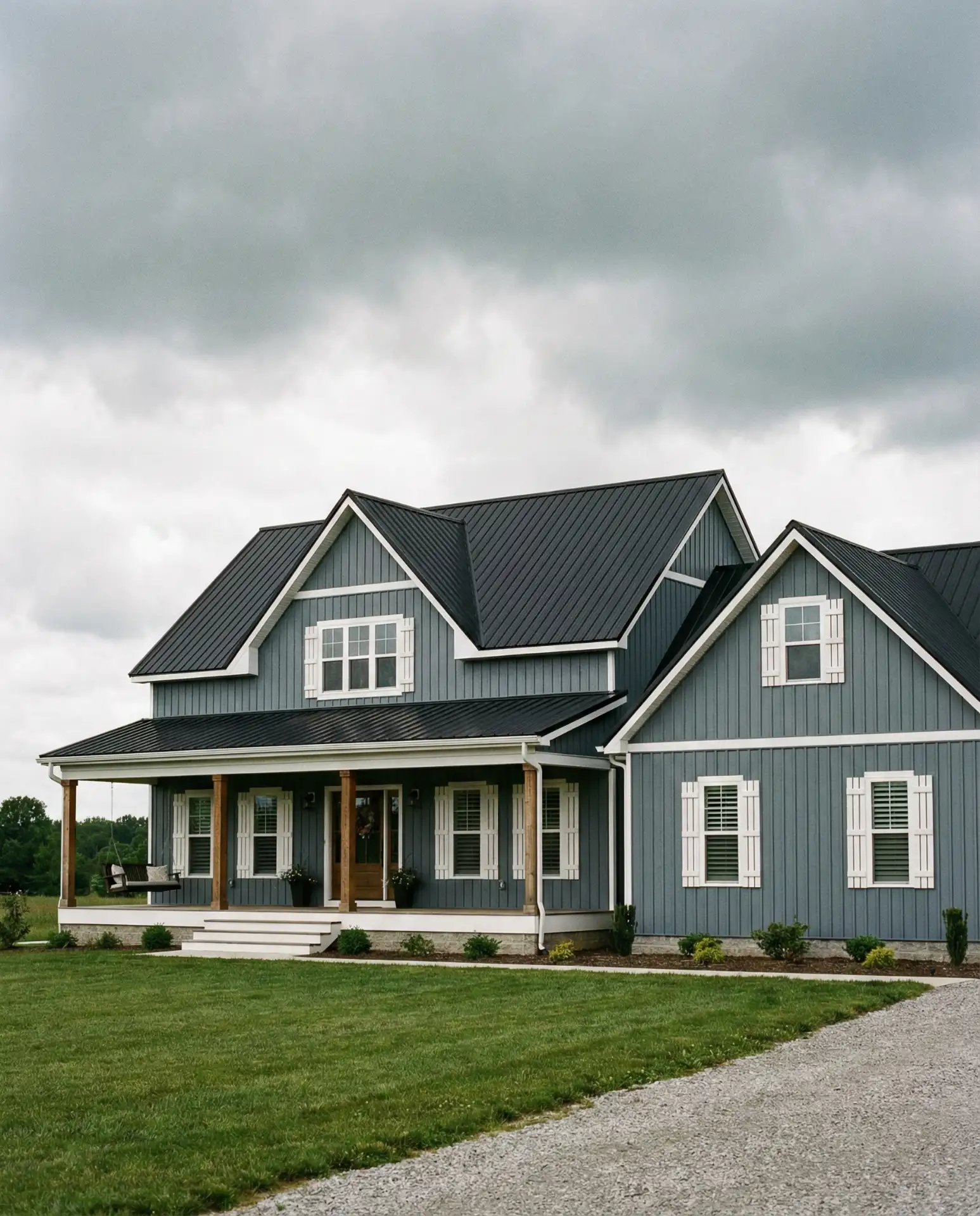 Blue-Gray Farmhouse with White Windows 2