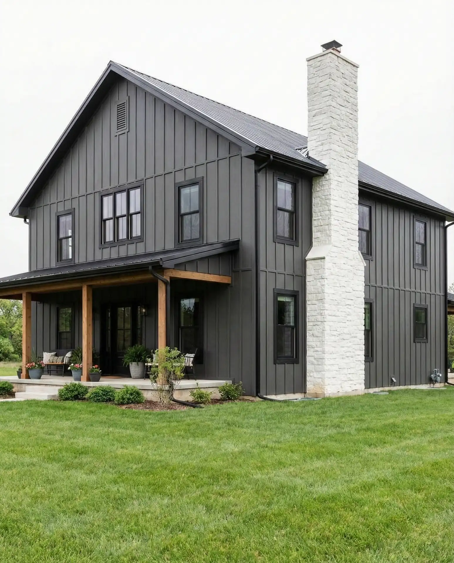 Charcoal Siding with White Stone Chimney 1