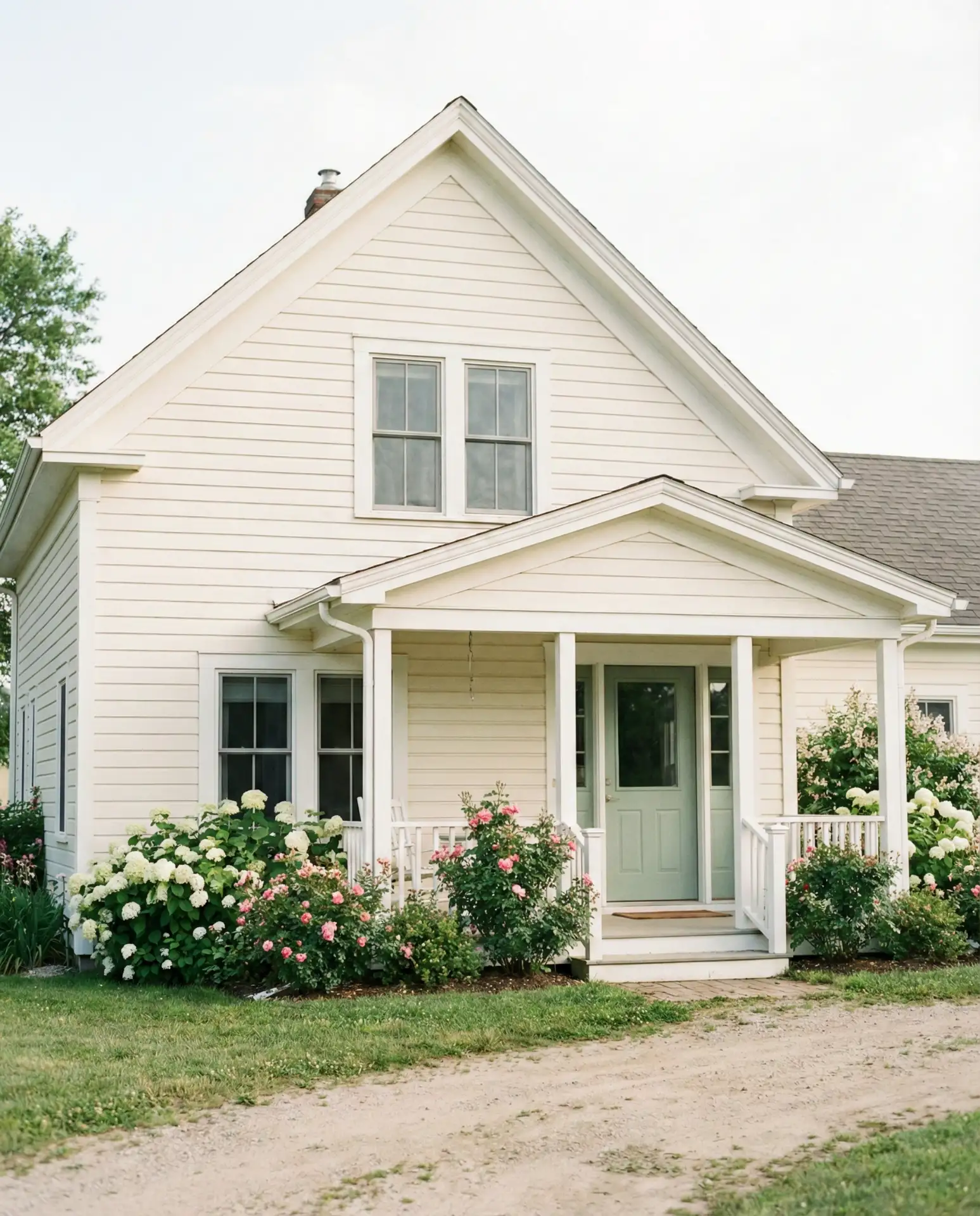 Cream Siding with Soft Green Door 2