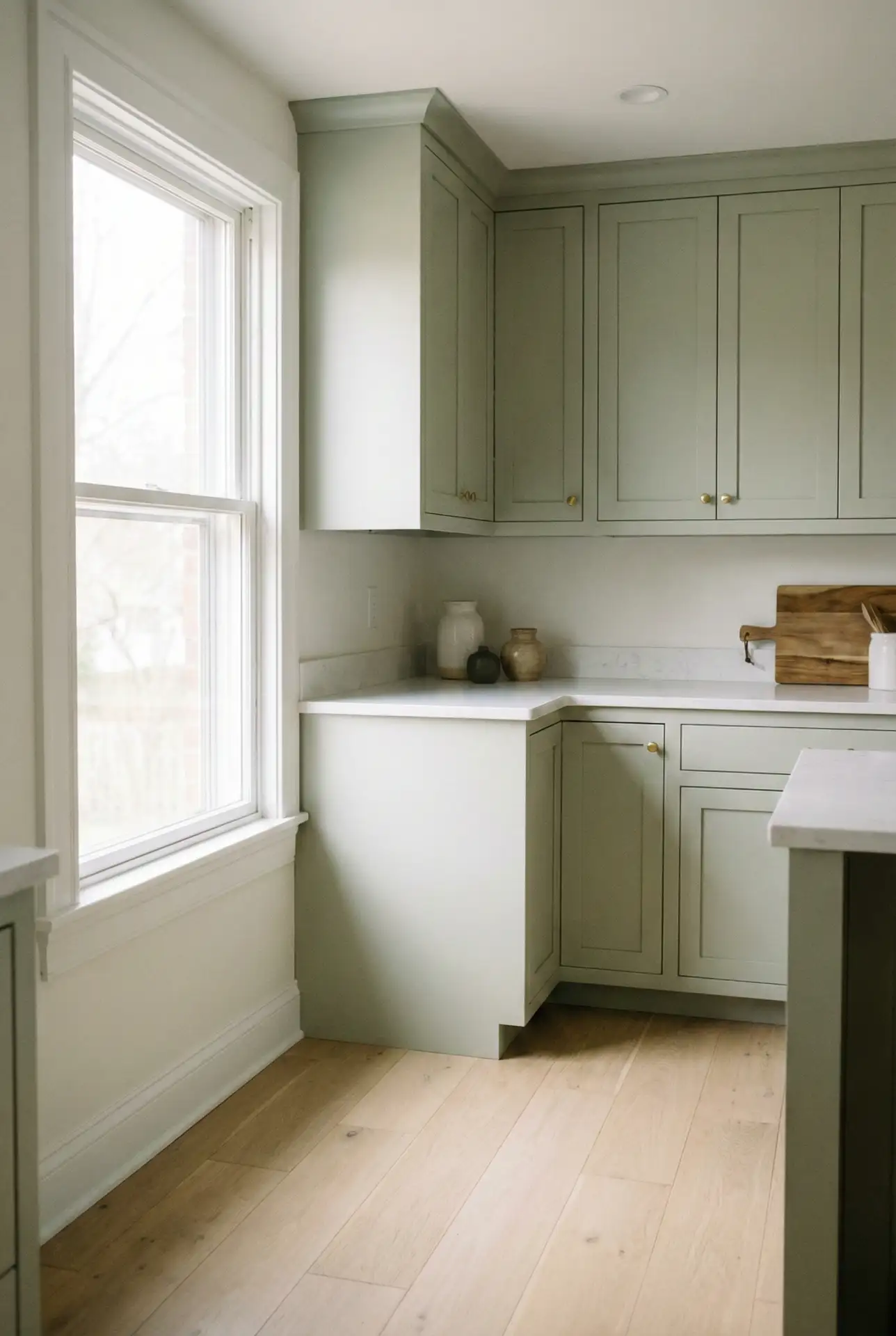 Light Sage Green Kitchen with Pale Wood Floors 2