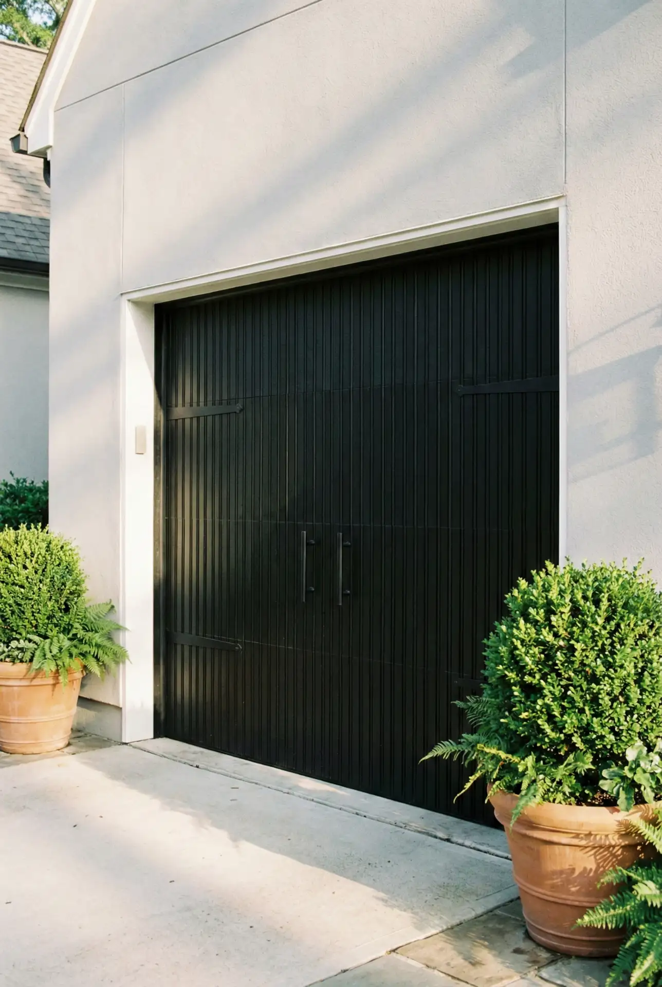 Sleek Black Garage Doors for Modern Curb Appeal 2