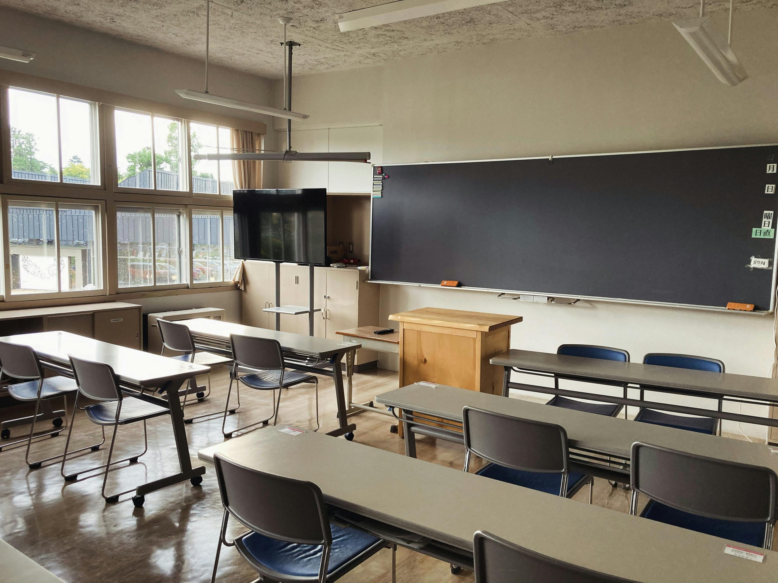 Bright, tidy classroom in Asahikawa, Hokkaido with natural light and modern furnishings.
