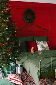 Christmas Bedroom With Red And Green Decoration' by Stocksy Contributor 'Irena Balashko' - Stocksy