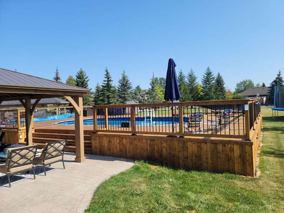27 Above-Ground Pools With Decks for Your Outdoor Space