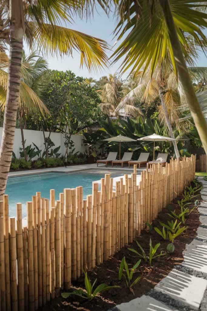 35 Pool Fence Ideas for a Safe, Stunning, and Functional Barrier