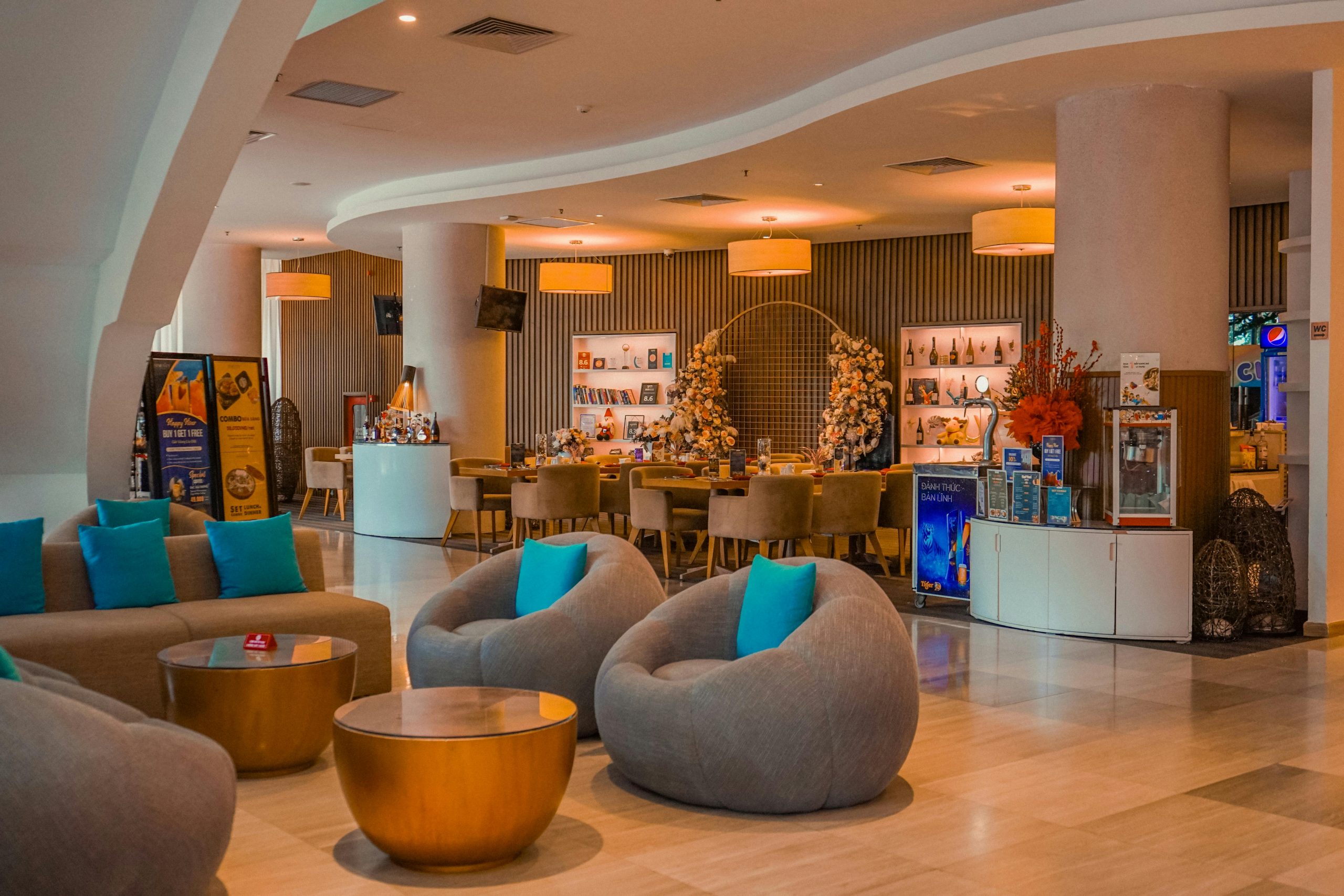 Elegant hotel lobby with contemporary seating and stylish decor creating a cozy atmosphere.