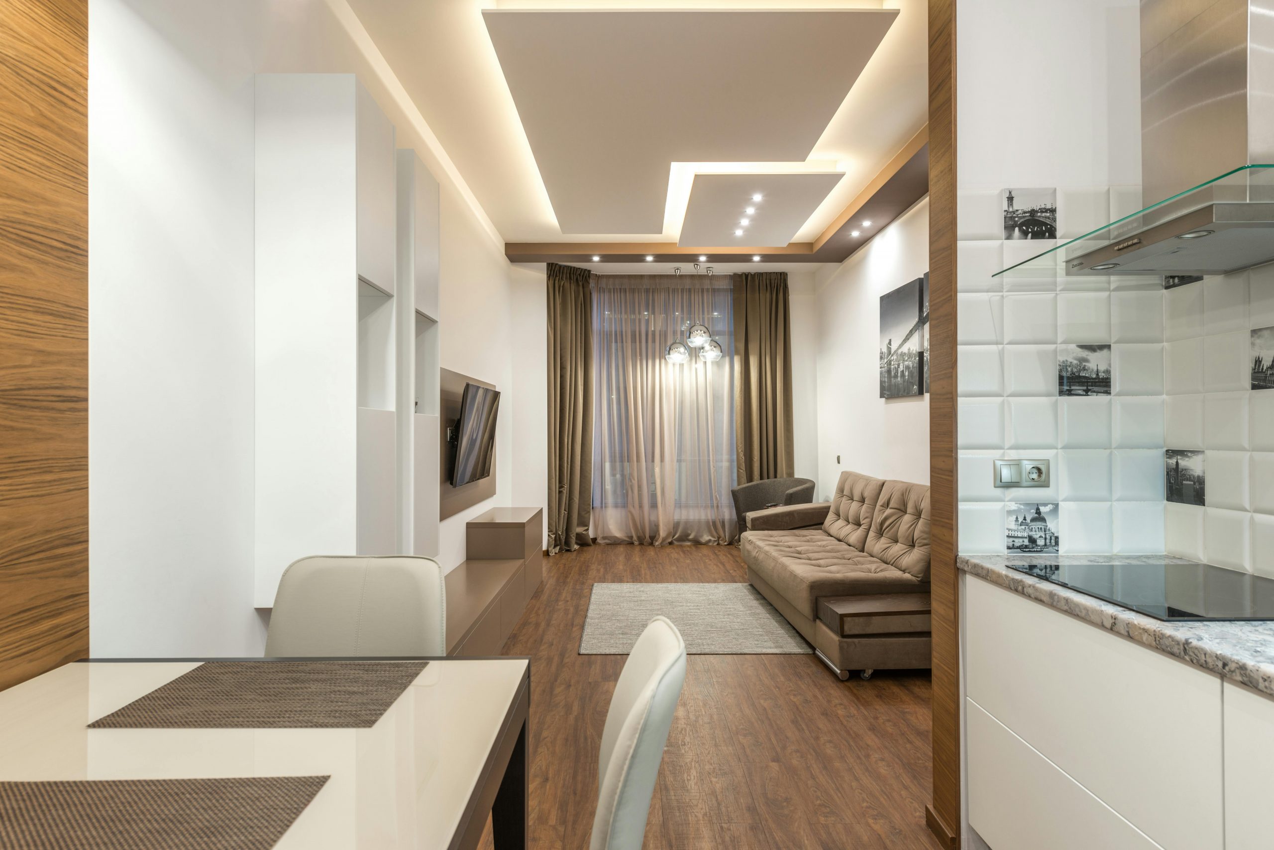 Elegant modern apartment interior with minimalist decor and cozy ambiance.