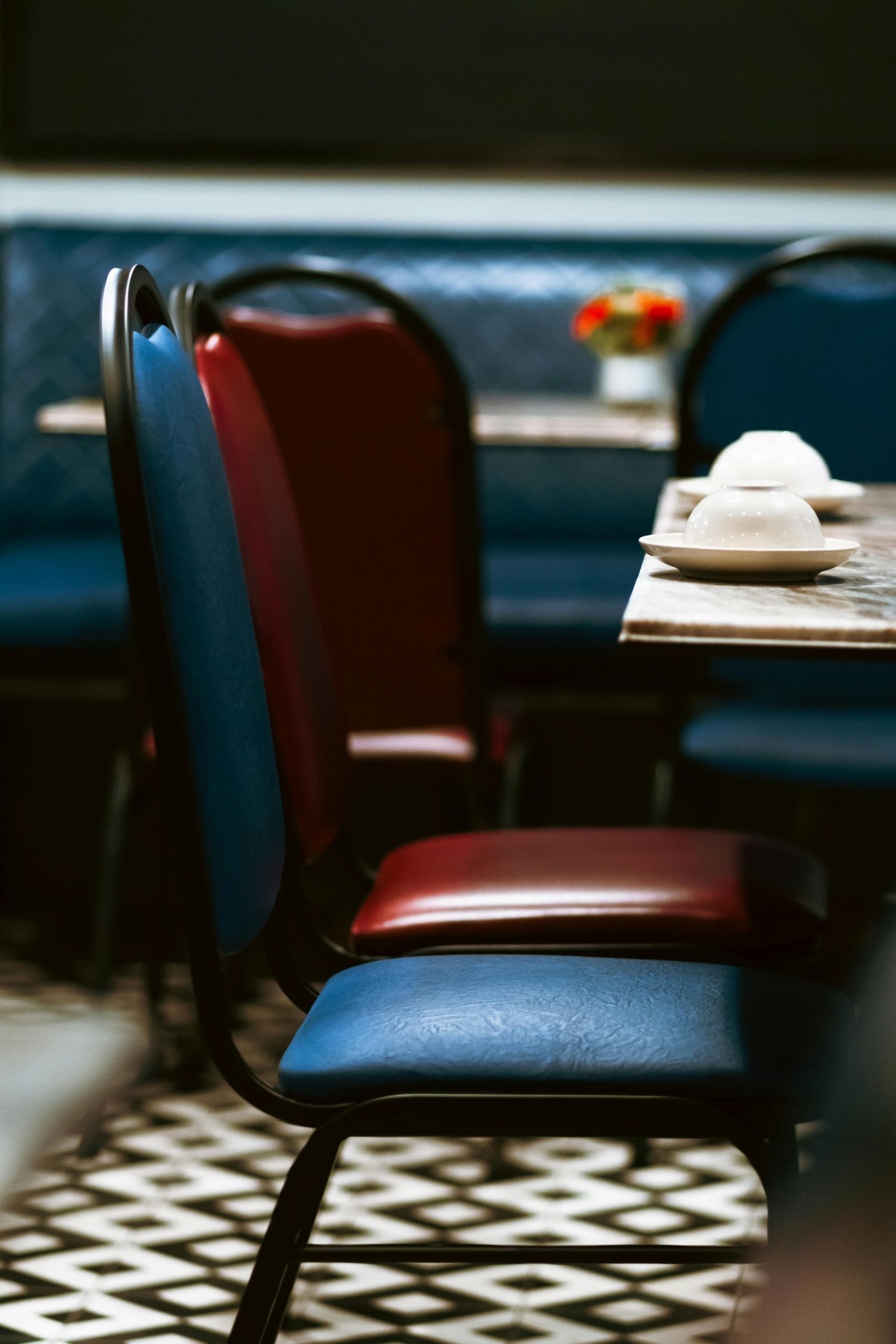 Empty chairs in a cozy restaurant setting with inviting ambiance.