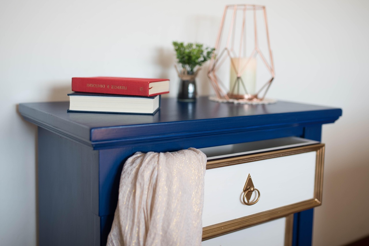 living room, mobile, chest of drawers, blue, candle, nature, books, the red book, blue book, scarf, drawers, plant, furniture, inside, decoration, house, home, design, classic, gold, white