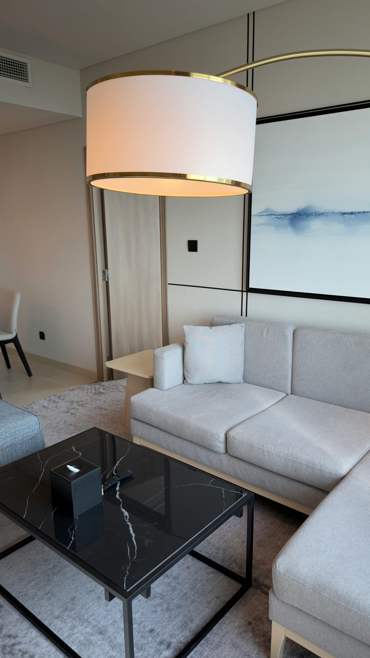 Stylish modern living room featuring elegant furniture and lighting. Ideal for home decor inspiration.