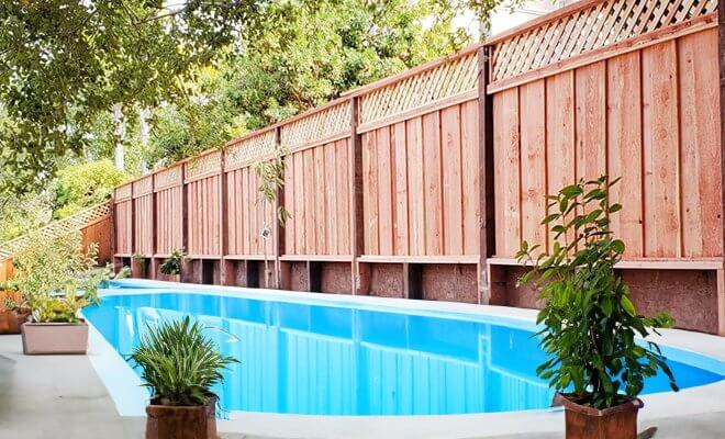 15 Pool Privacy Fence Ideas for 2026 [with photos]