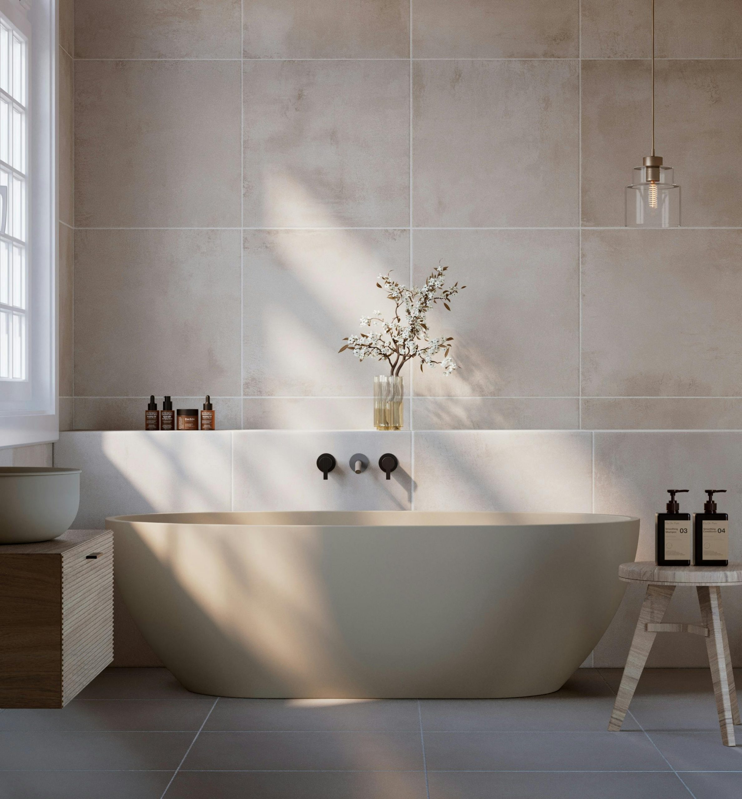 A serene minimalist bathroom featuring a freestanding tub, natural light, and elegant decor.
