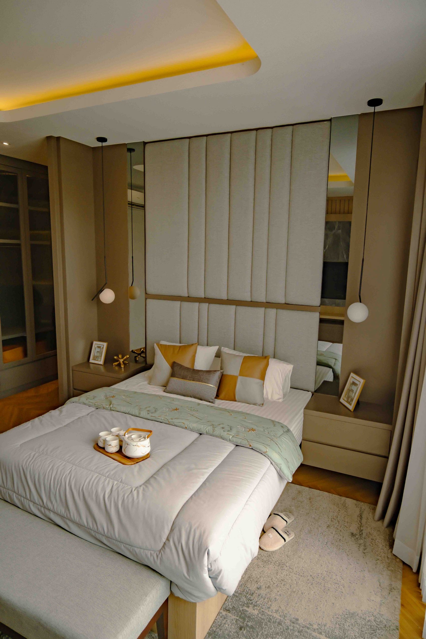 A stylish, comfortable bedroom with modern design elements and cozy ambiance.