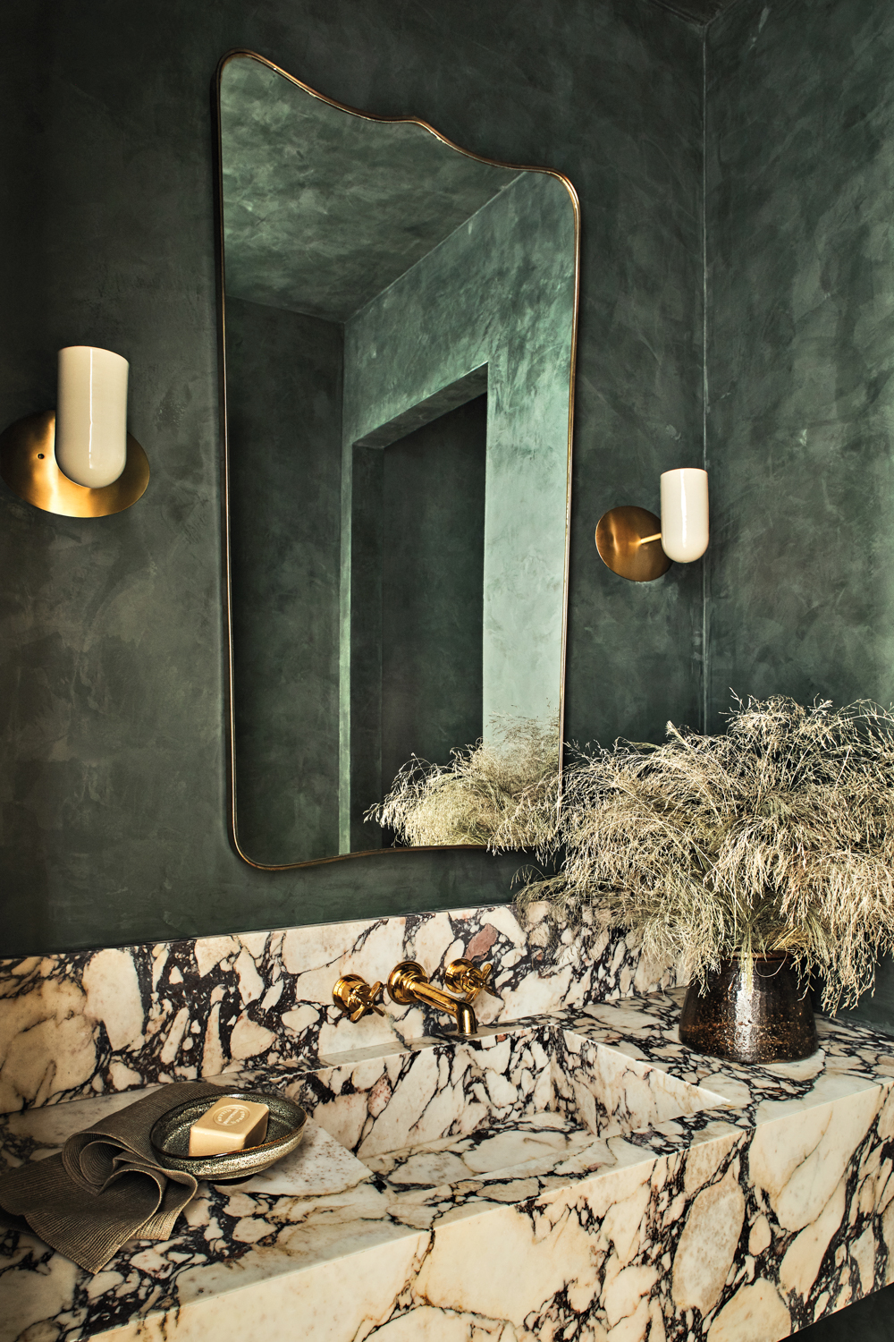Behind This Moody Green Bathroom That's Dramatic And Daring | LUXE Interiors + Design