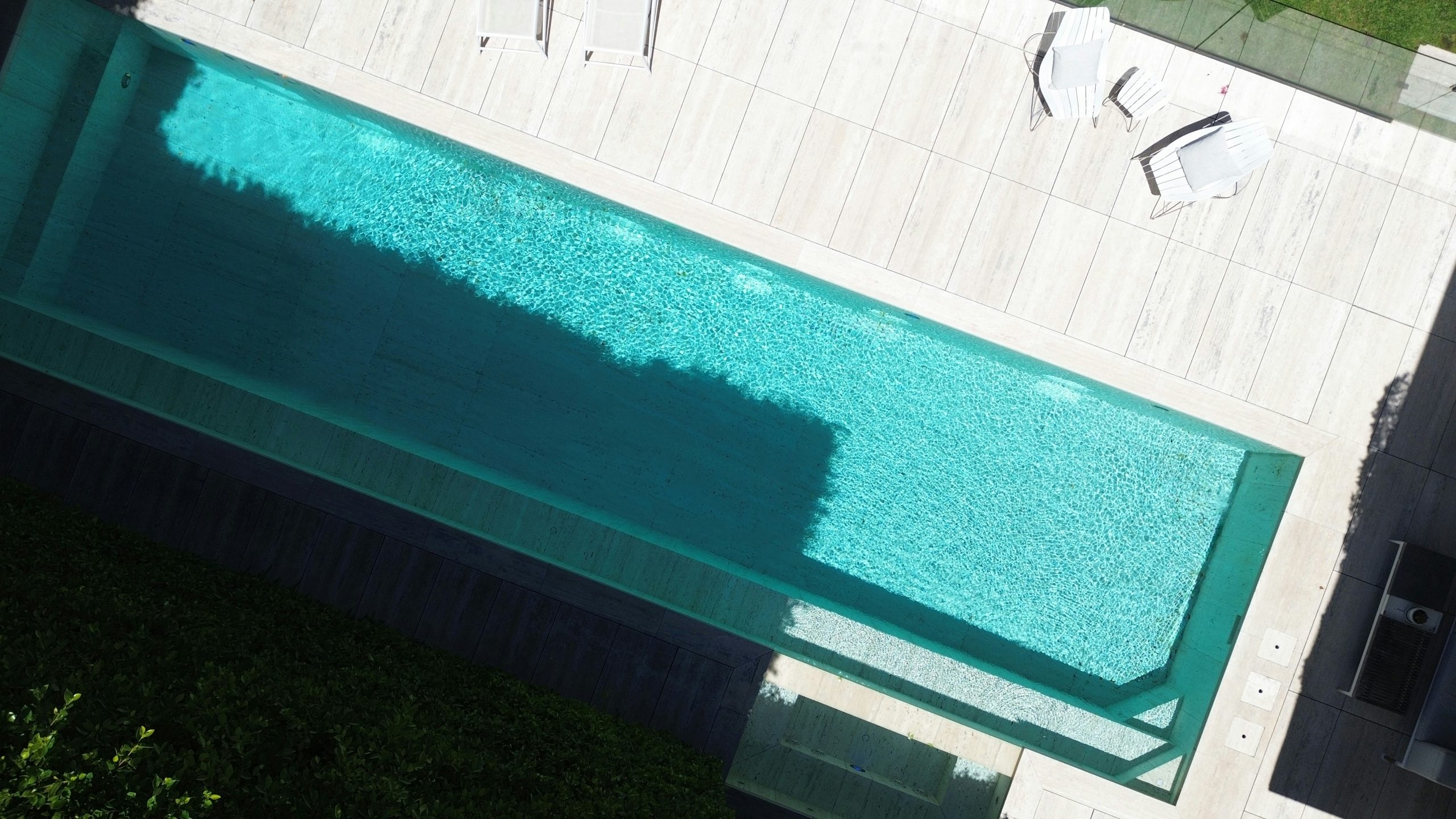 DCIM\100MEDIA\DJI_0029.JPG Drone image of Australian contemporary pool. White tiles, blue pool.