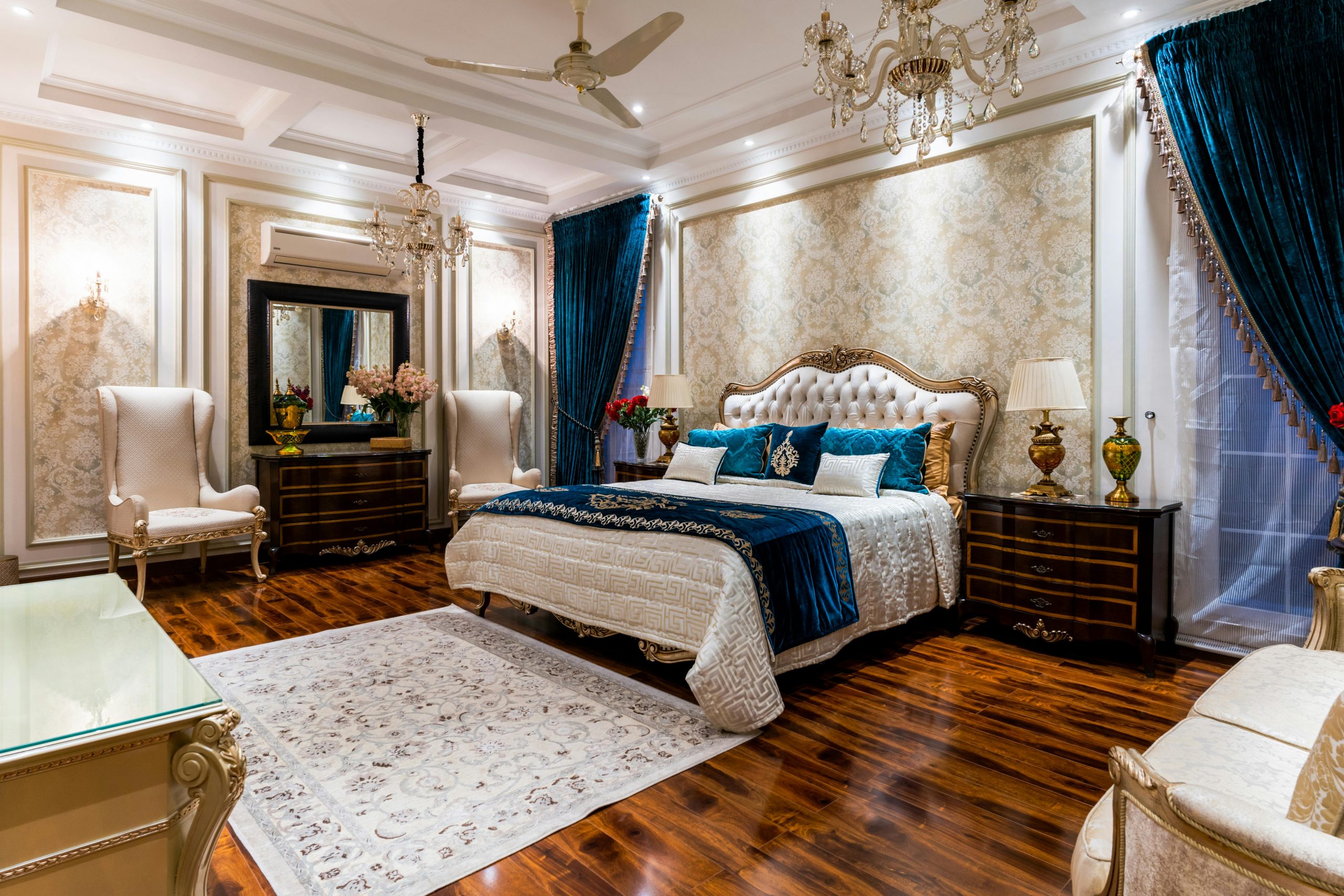 Luxurious bedroom featuring classic decor and opulent furnishings in a sophisticated setting.