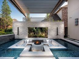 Modern Backyard With Sleek Pool and Sunken Lounge | HGTV