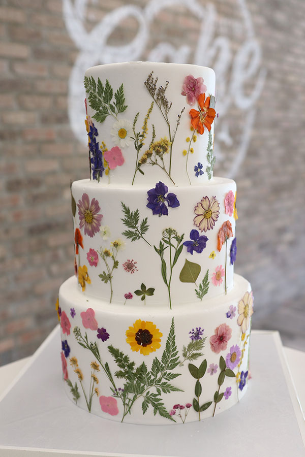 Whimsical Garden-Inspired Buttercream Cake with Pressed Flowers