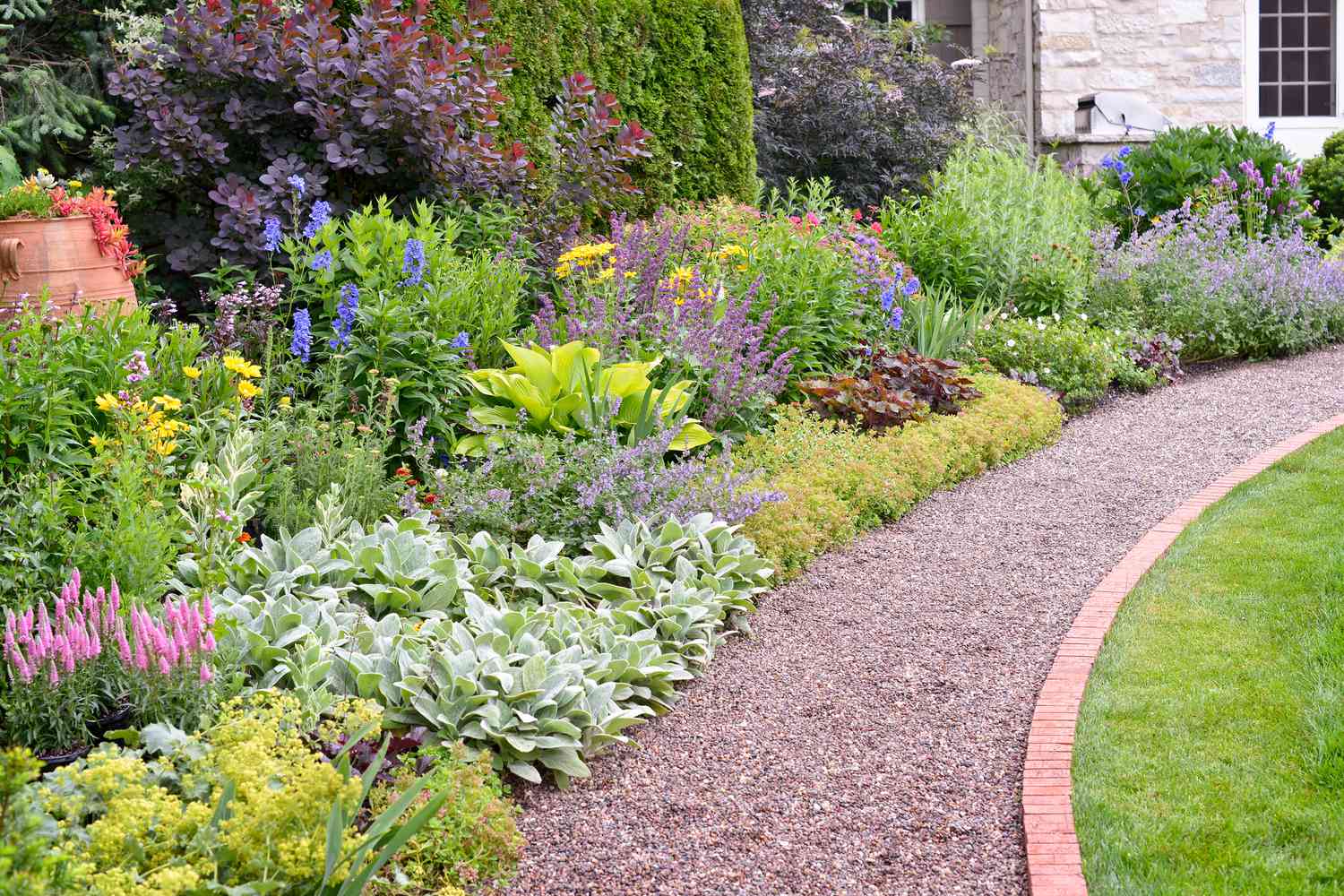 15 Brick Edging Ideas to Affordably Frame Your Garden Flowers