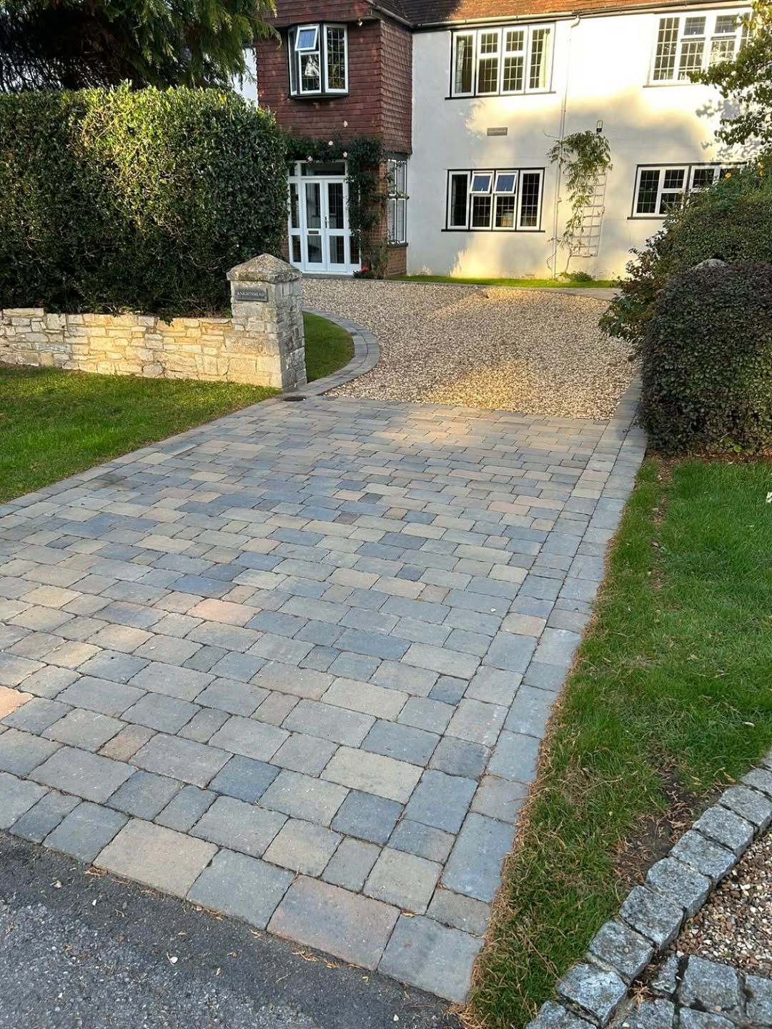15 Driveway Ideas for 2026 That Replace Plain Asphalt With Designs That Actually Frame the House