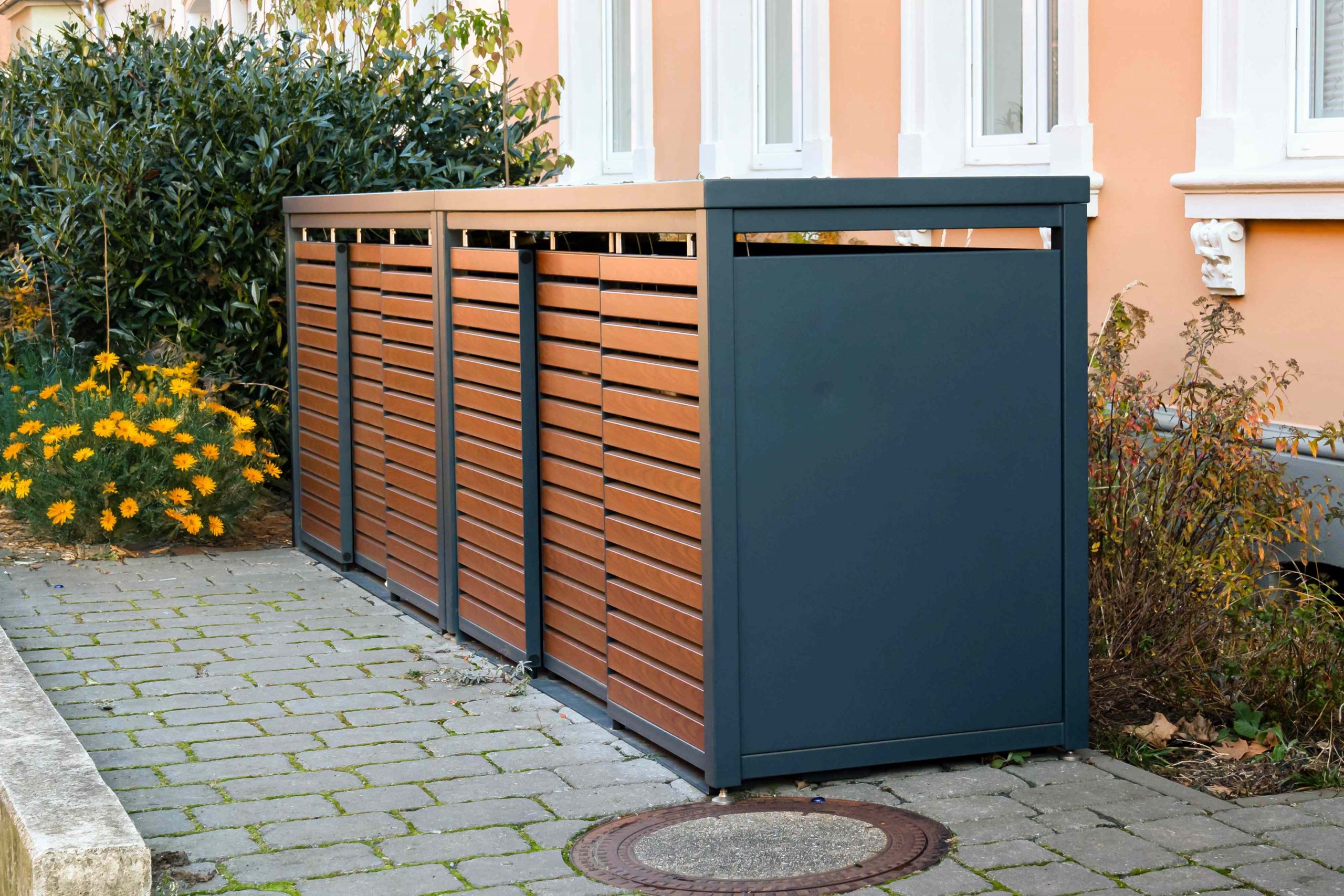 5 Designer-Approved Ways to Hide Your Garbage Cans
