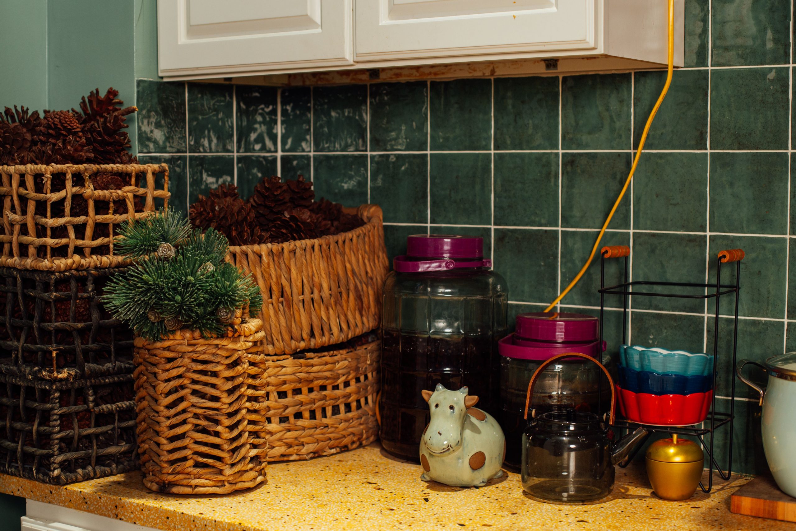 A charming kitchen corner featuring rustic baskets and kitchen accessories.