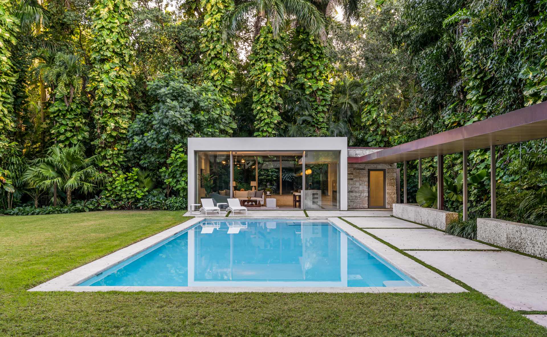 A Pool House And Loggia Enhance This Lush Backyard Experience - Design Skill Magazine