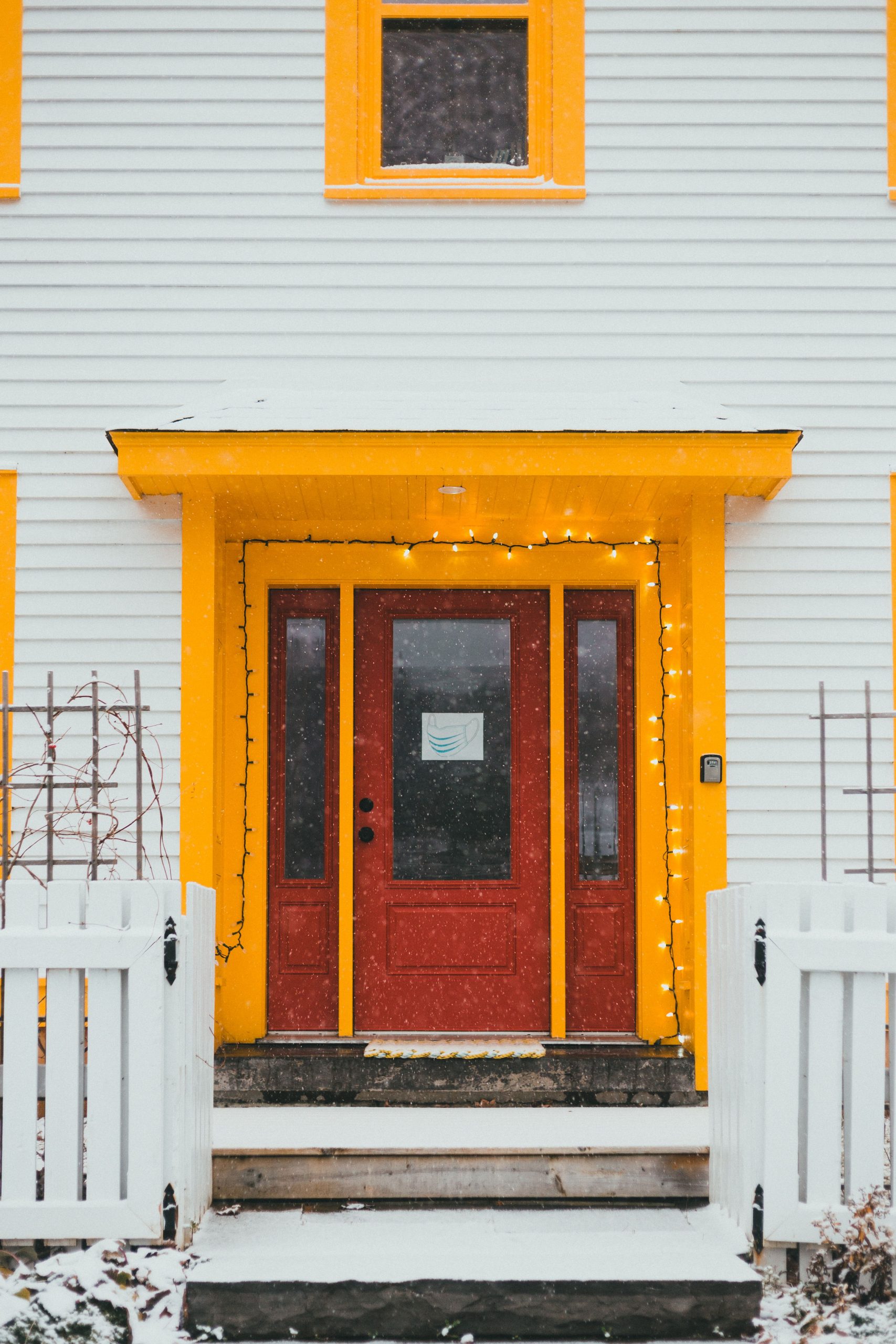 A Yellow and Red Wooden Door · Free Stock Photo