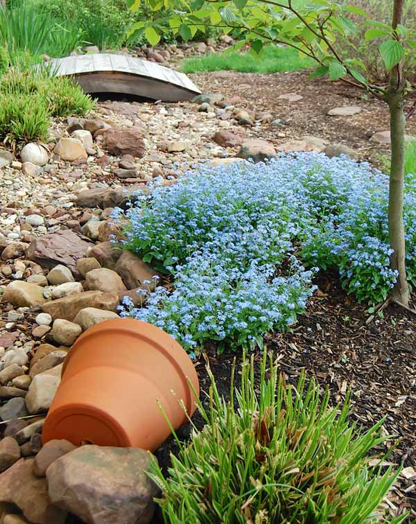 Add Some Magic To Garden with Spilled Flower Pots