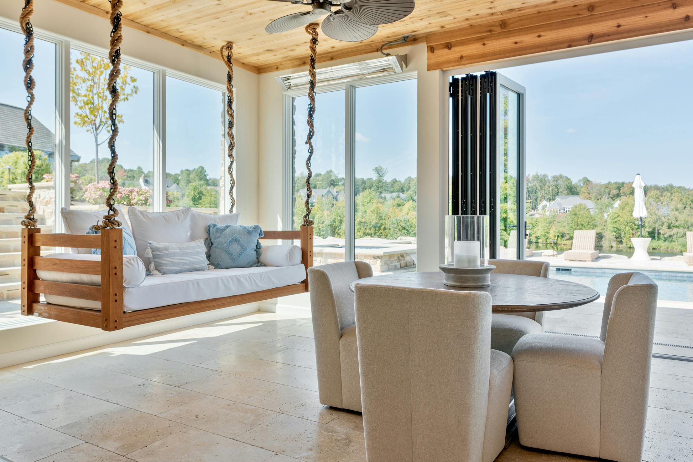 Charming Pool House Transforms with Aluminum Clad Bifold Doors
