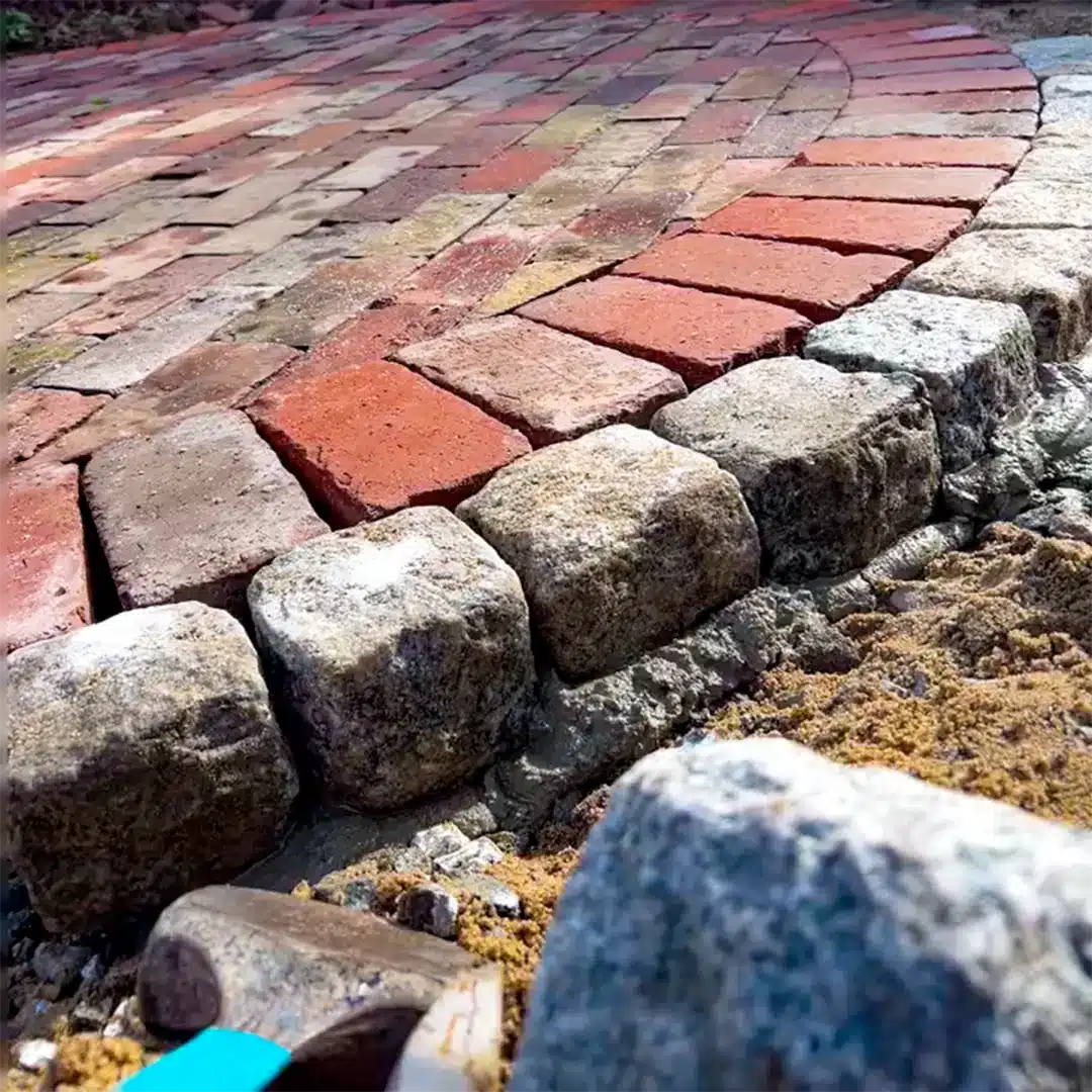 Mason's unique residential work shows the versatility of a single paver style: Rumbled® Main Street - Pine Hall Brick