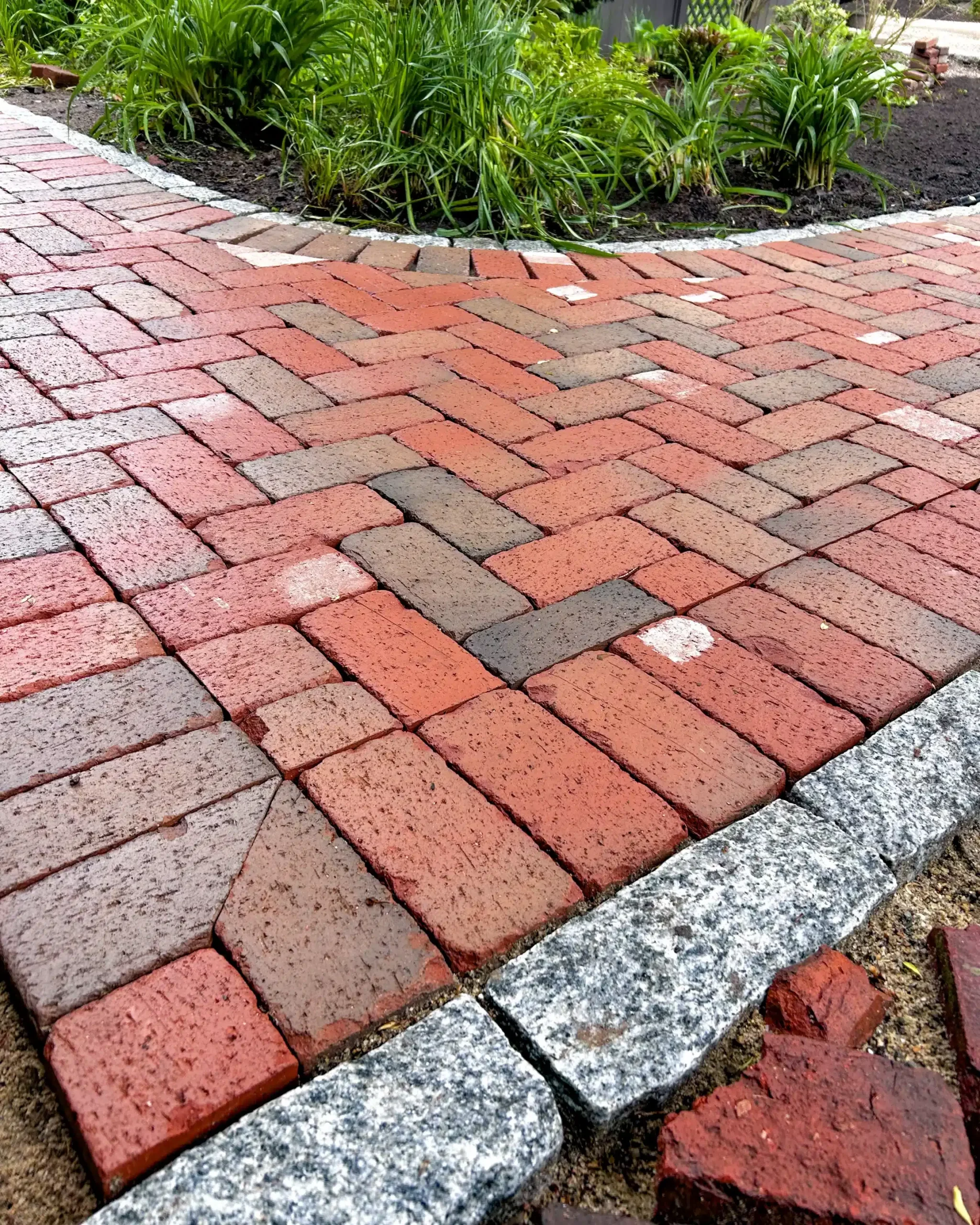 Mason's unique residential work shows the versatility of a single paver style: Rumbled® Main Street - Pine Hall Brick