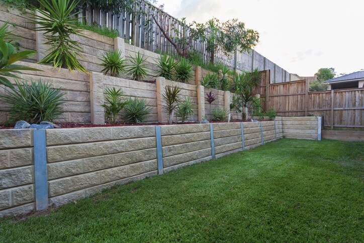 Retaining Wall Ideas For Sloped Backyard | VistaScapes, LLC