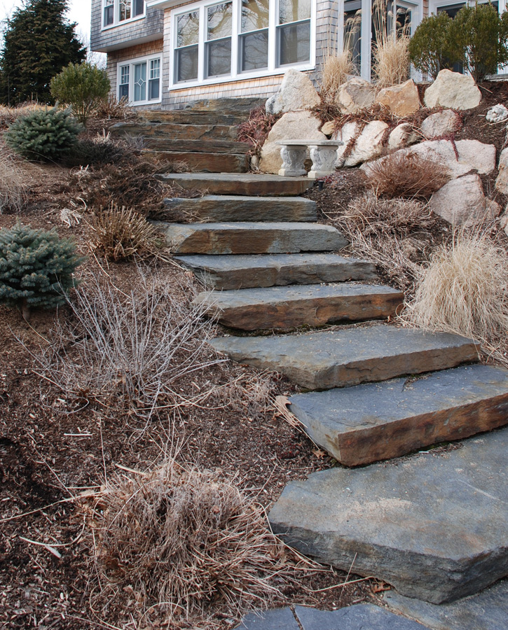 Rough-Hewn Stone Staircase and Retaining Wall - K&R Landscape