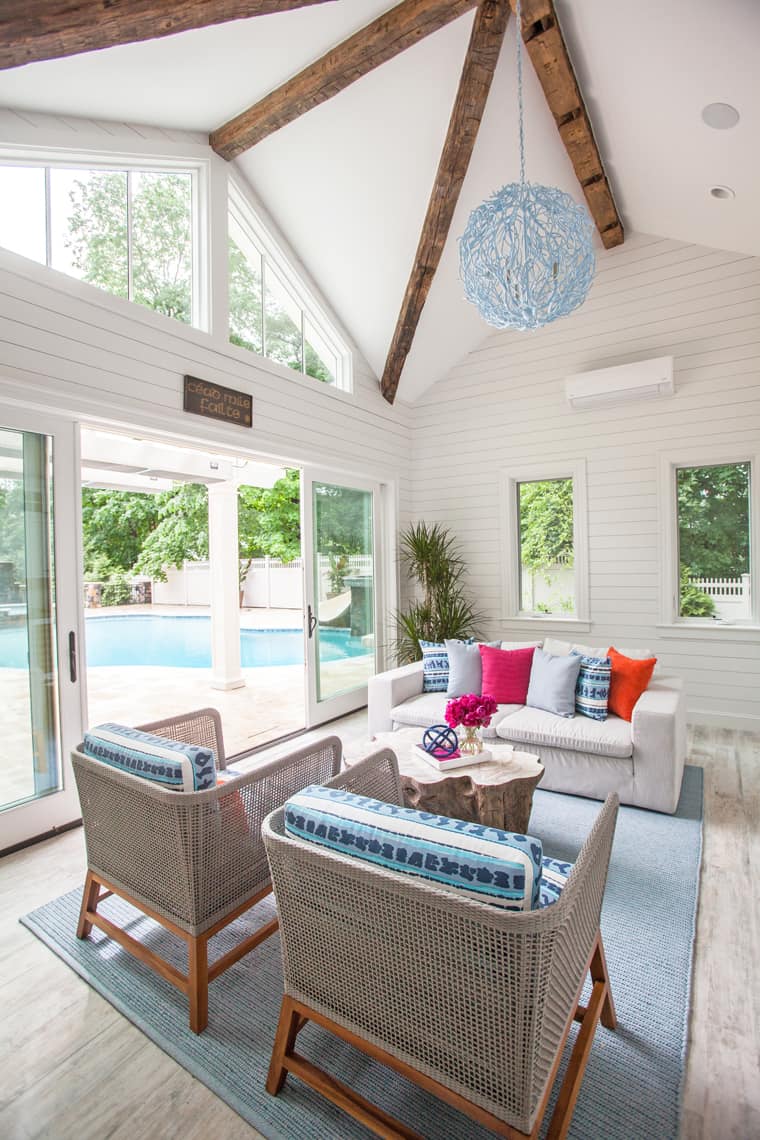 Stunning Freestanding Pool House designed by DAG Design using shades of blue to reflect its beautiful surroundings