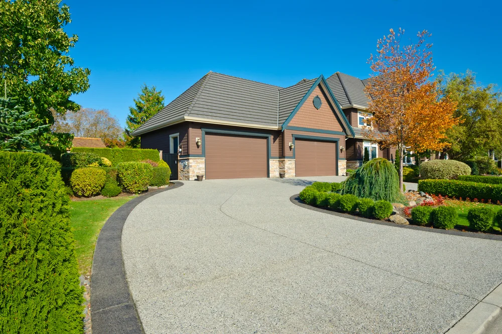 The Art of Driveway Design: Collaborating with Paving Contractors