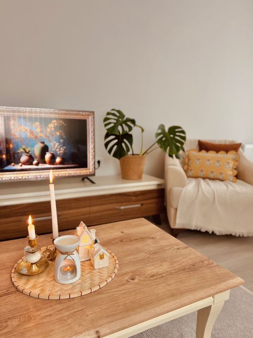 Cozy Living Room with Coffee and Candles · Free Stock Photo