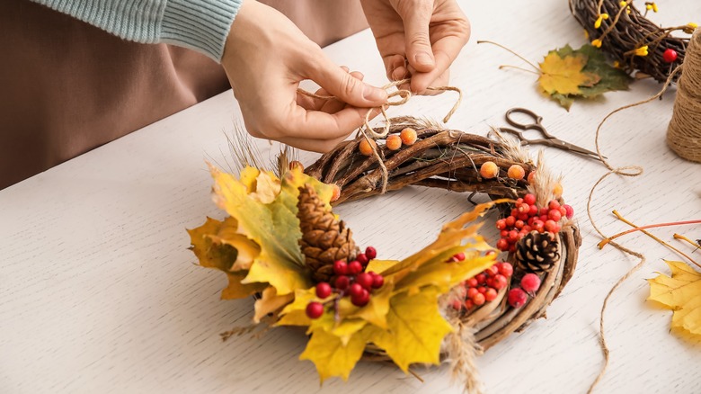 DIY A Thanksgiving Wreath For Your Front Door Using Only Items From Dollar Tree