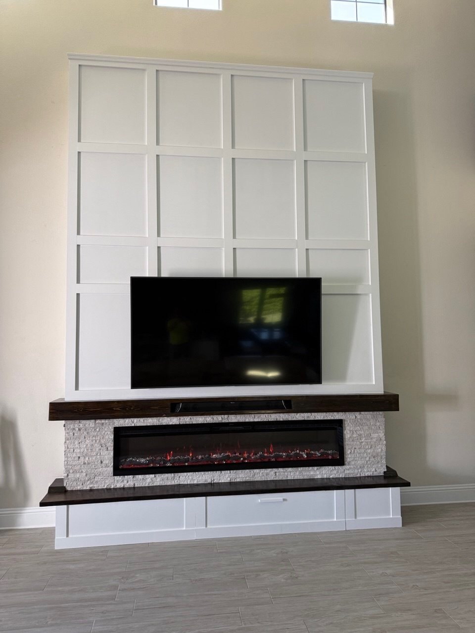Fireplace Media Wall with Trim and Stone in Charlotte, NC
