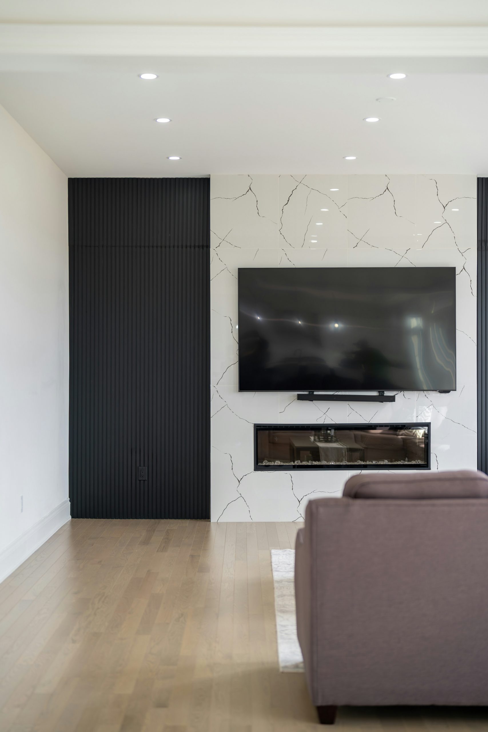 Modern living room with fireplace and television